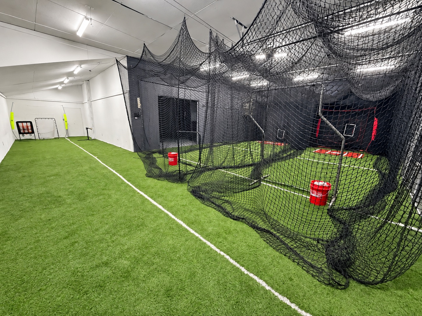Trackside’s indoor turf training floor and netted batting cages